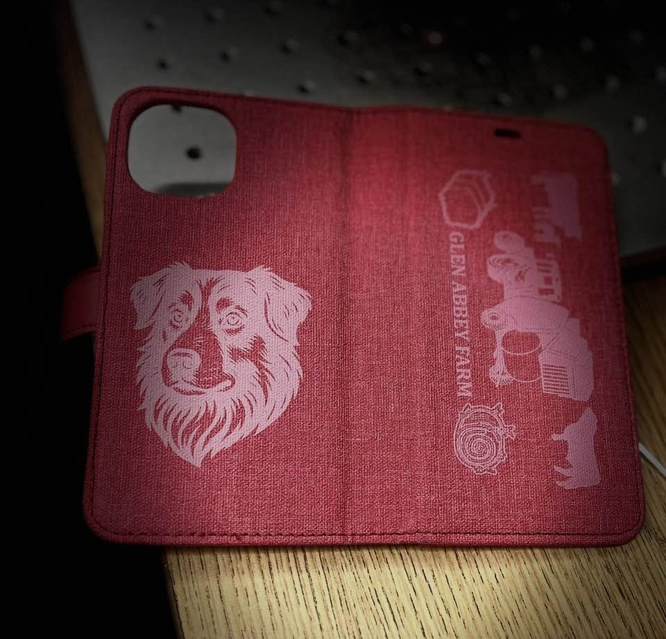 Collection of custom laser-engraved leather patches in different shapes and logos